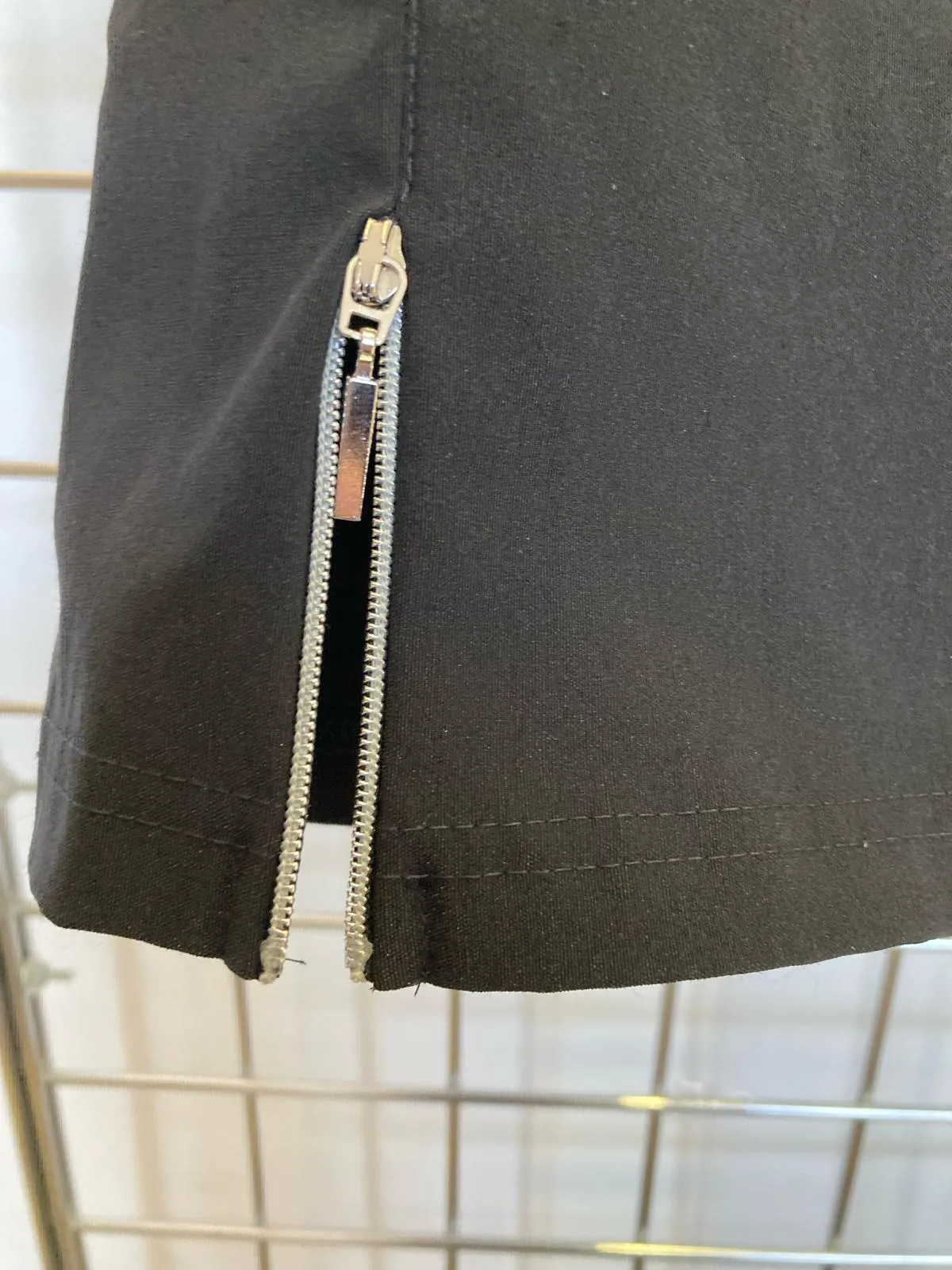 Black stretch zip pants