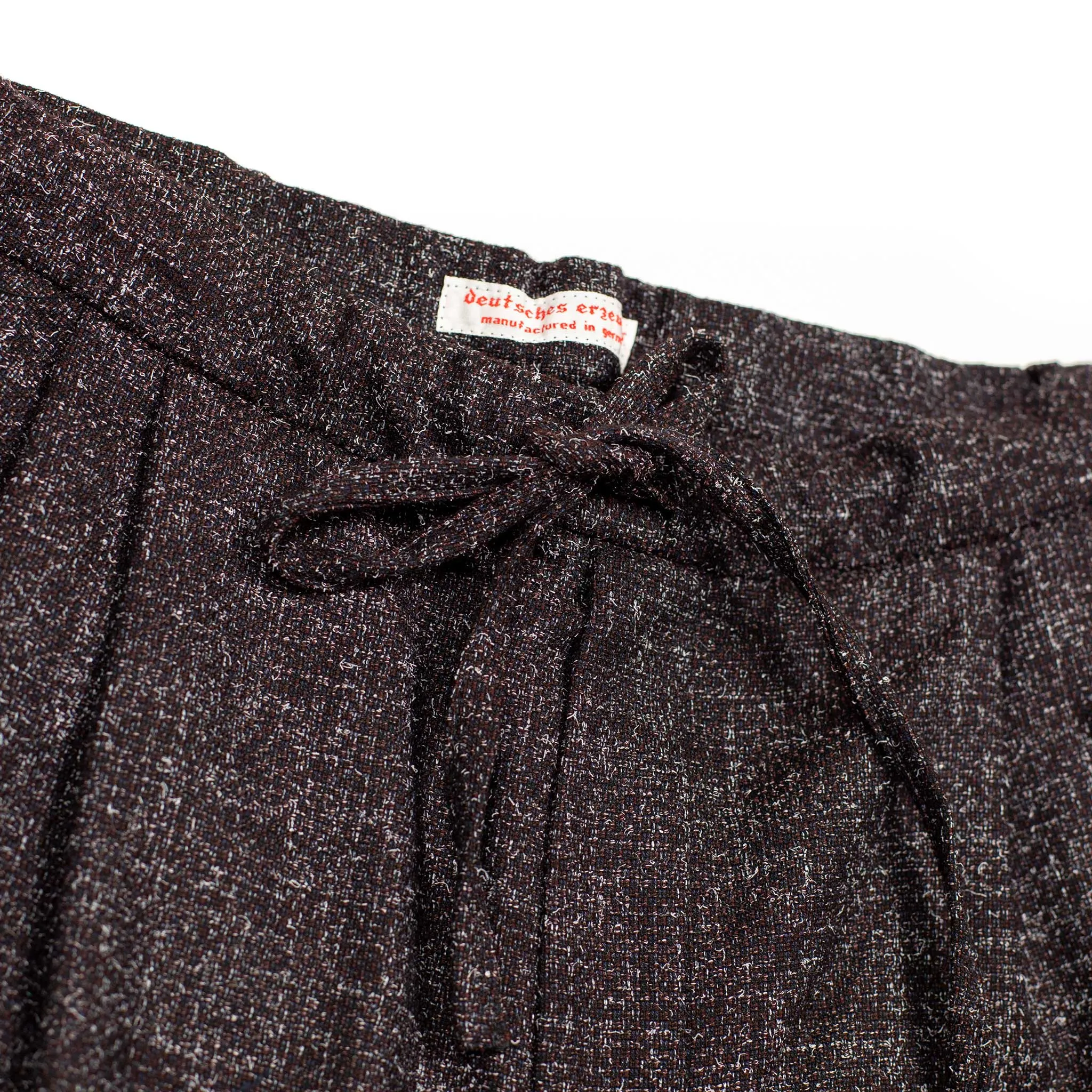 Pleated drawstring trousers in brown, navy and white speckled wool