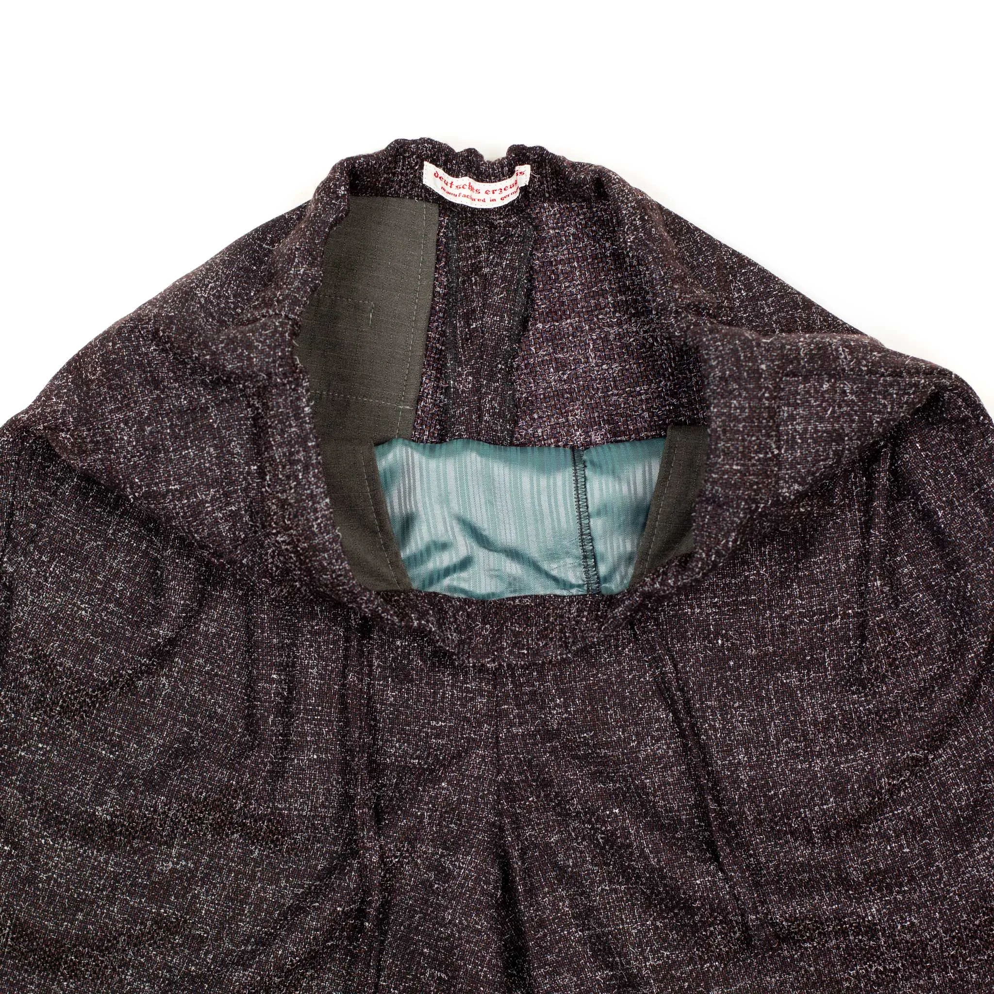 Pleated drawstring trousers in brown, navy and white speckled wool